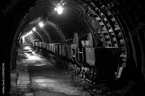 An old, hollow underground tunnel in a closed coal mine.