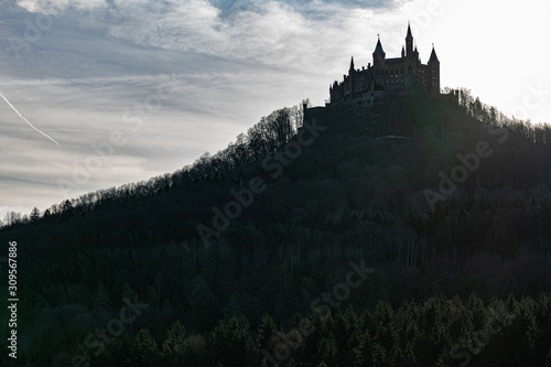 Hilltop castle of Hohenzollern in Germany with sun behind
