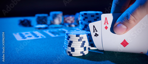 Man plays poker in the casino