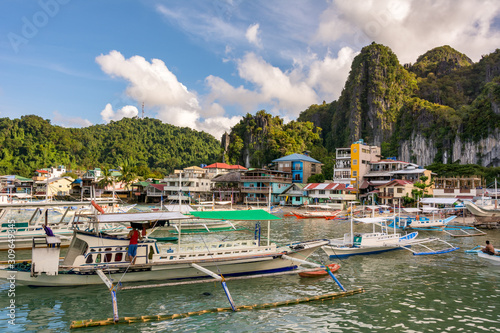 Tourist and fishing boats off the coast of El Nido town