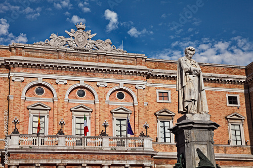 Recanati, Marche, Italy: the statue of the poet Giacomo Leopardi and the town hall