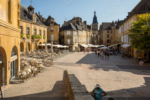  Historic houses surrounding Place de la Liberte in Sarlat la Caneda in Dordogne Department, Aquitaine, France