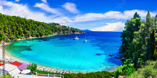 Best beaches of Alonissos island - tranquil organized Milia. Sporades, Greece