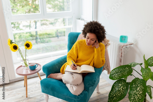 Woman writing a diary