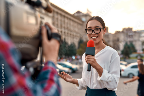 Coverage you can count on. TV reporter presenting the news outdoors. Journalism industry, live streaming concept.