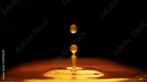 glowing yellow colored drop