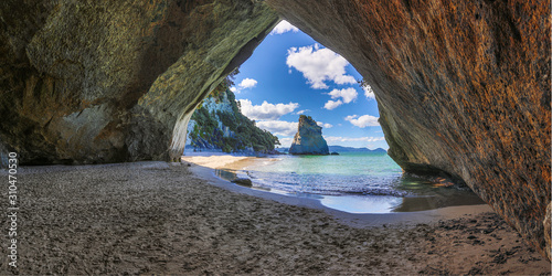 View on Hoho Rock from inside Cathedral Cove on northern island of New Zealand wirhout people in summer