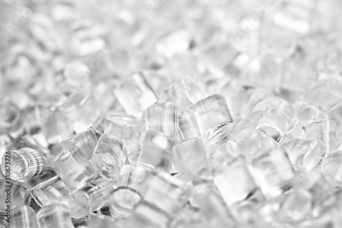 Background of plastic granules. Abstract background of artificial diamonds.