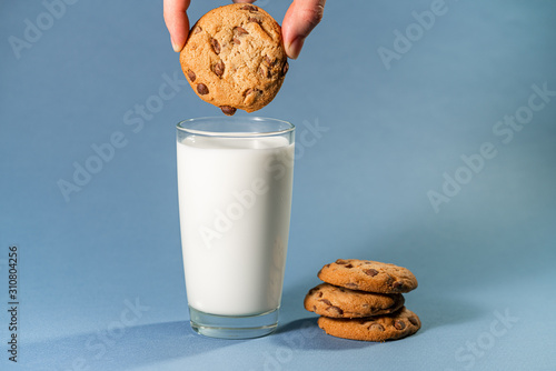 cookies with chocolate and a glass of milk