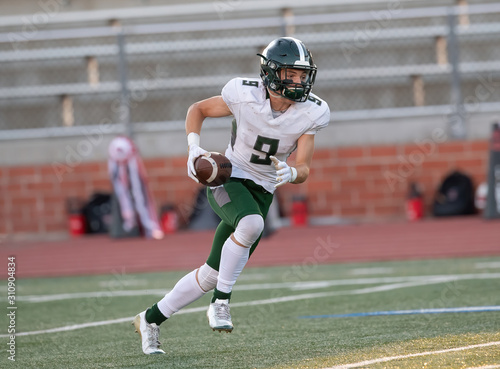 Football player in action during a game in South Texas