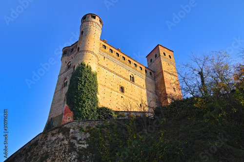 Afternoon winter view on the castle of Serralunga d'Alba, a village in the famous Langhe region, Cuneo, Piedmont, Italy