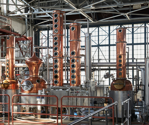 stills in a warehouse distillery