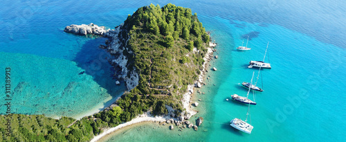 Aerial drone ultra wide panoramic photo of tropical exotic seascape in Mediterranean Greek Ionian island of Paxos with turquoise sea