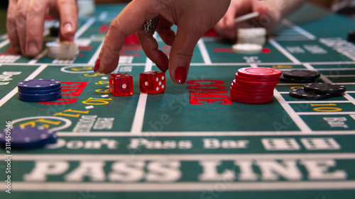 casino craps table with chips and dice