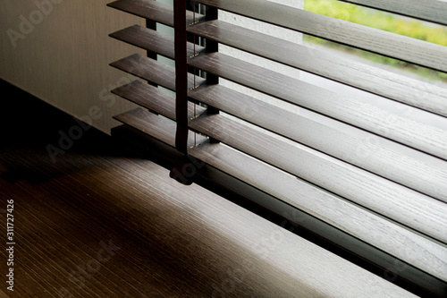 wooden window blind with daylight texture background