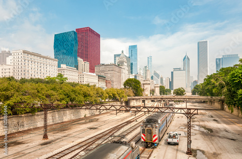 View of Chicago Downtown Skyline with railroad yard under bridge, USA