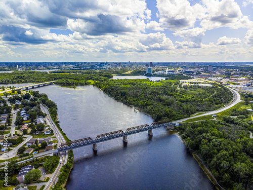 Drone shot above Rapibus corridor bridge in Gatineau, Quebec on a summer day facing Ottawa.