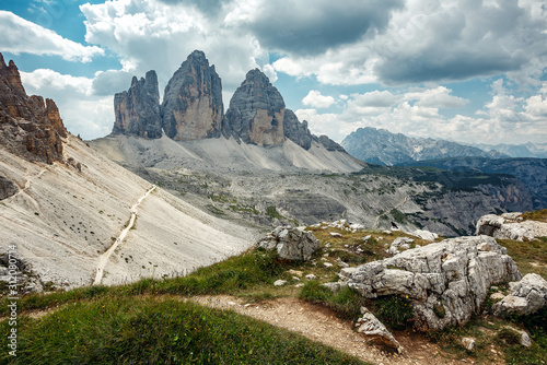 Awesome alpine highlands in sunny day. Amasing nature landscape. Tre Cime di Laveredo, three spectacular mountain peaks in Tre Cime di Lavaredo National Park, Sesto Dolomites, South Tyrol, Italy