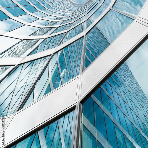 Curved diagonal perspective lines - abstract office building architecture detail background with modern glass windows on a skyscraper - square layout