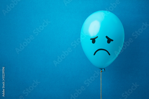 Stock photo of a blue monday balloon on a blue background