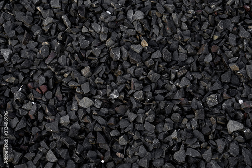 Crushed gravel texture background, background made of a closeup of a pile of crushed stone, pile of pebbles, Gravel stone background or texture, stones rubble and gravel.