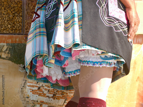 Traditional portuguese woman wearing a skit with 7 petticoats in Nazare in Portugal