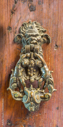 Vintage door handle on a old door
