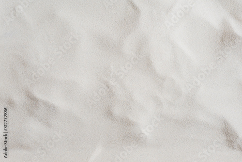 Seamless white sand background. Beach. Close-up