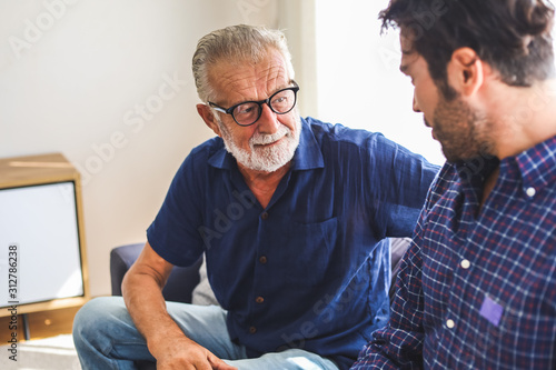 Family time dad and son talking discussion lifestyle in holiday at home.