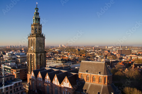 Aerial view over the Dutch city Groningen and the medieval Martini tower, seen from the roof of the Forum