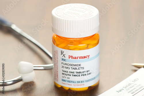 Generic Furosemide Prescription On Physician's desk with stethoscope and prescription pad