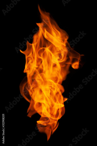 Fire and burning flame isolated on dark background for graphic design purpose