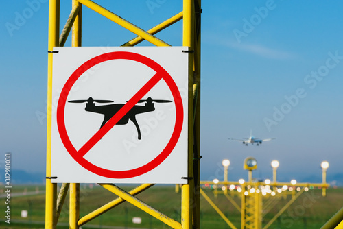 No drone zone at airport runway. Airport airspace perimeter prohibition drones fly sign.