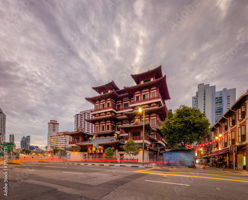 Buddha's Tooth Relic Temple, Singapore - Aug 2019 - The famous pagoda during blue hour sunset dramatic afternoon