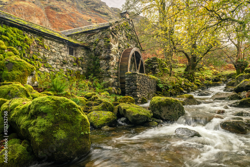 Old mill with a waterwheel built in the early 1800's in Borrowdale in the Lake District, Uk