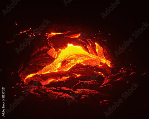 Scenic view of a part of a lava flow in the dark, the hot lava shows up in yellow and red shades - Location: Hawaii, Big Island, Kilauea volcano, Puna district, Kalapana