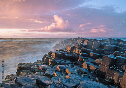 Sunset with the Giant's Causeway in the foreground