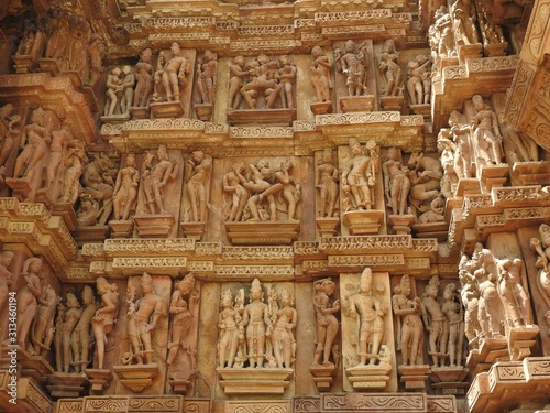 Erotic Human Sculptures at Vishvanatha Temple, Western temples of Khajuraho, Madhya Pradesh, India. Built around 1050, Khajuraho is UNESCO World heritage site and is tourist destination for erotica.