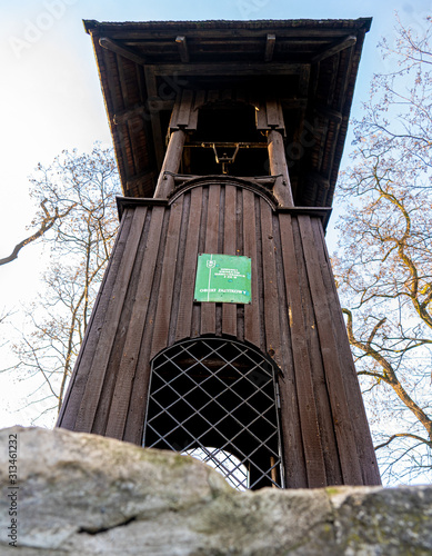 Old wooden belfry of the miners from the silver mine at the church of Piotr and Paweł in Tarowskie Góry