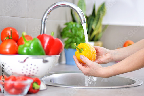 Washing vegetables.