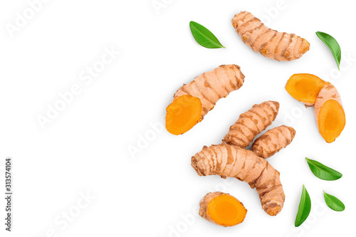 turmeric root and slices isolated on white background with copy space for your text. Top view. Flat lay