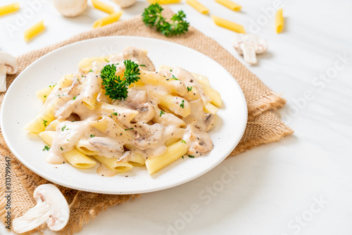 penne pasta carbonara cream sauce with mushroom