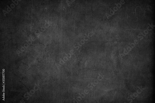 Blank front Real black chalkboard background texture in college concept for back to school kid wallpaper for create white chalk text draw graphic. Empty old back wall education blackboard.