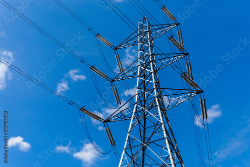 Electricity pylon with blue sky