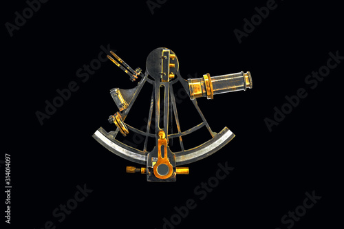 Sextant astrolabe isolated on black background. Ancient bronze navigation instrument