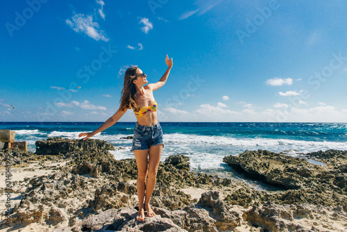 Cancun, Quintana Roo, Mexico. Girl on Gaviota Beach in Cancun