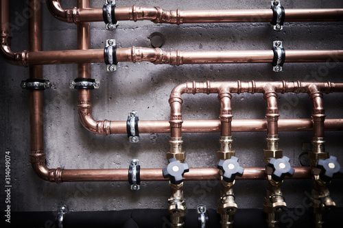 Plumbing service. copper pipeline of a heating system in boiler room