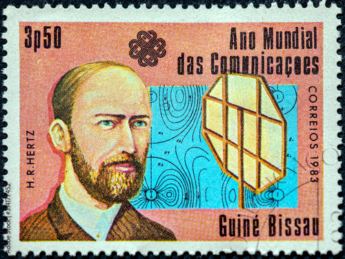 A stamp printed in Guinea-Bissau dedicated to the World Communications Year shows a German physicist Heinrich Hertz