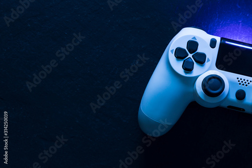 Video game gaming controller night with lights dark background top view