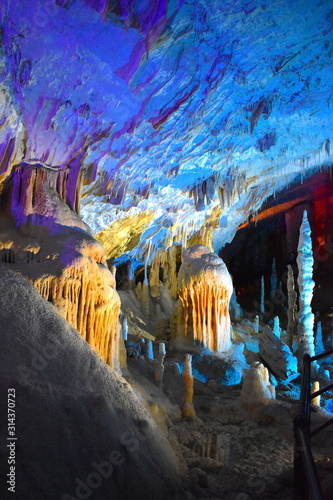 Captivating cave with magnificent stalactites stalagmites baby dragons. Postojna Cave is horizontal which made it possible to set up railway underground. Guided tours daily including public holidays